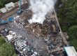 Why Practical Compliance Matters - Environmental consultant reviewing a fire prevention plan at a UK waste site
