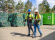 Environmental consultants reviewing a UK permit application with technical documents